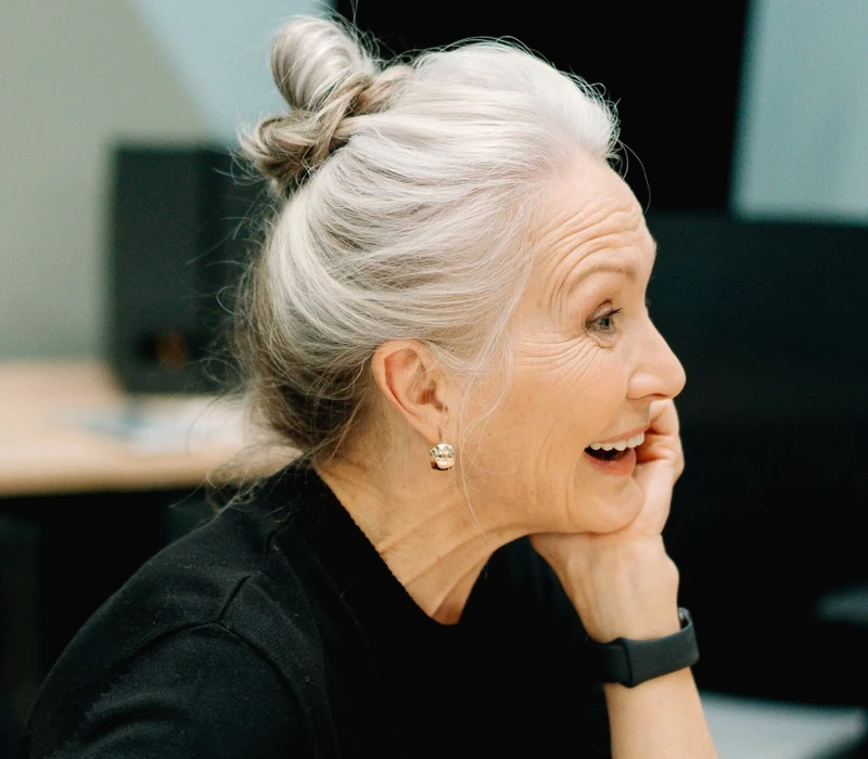 A longtime employee laughing during a session